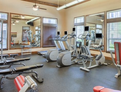 Fitness center at Grand Cypress luxury apartment homes in Houston, TX