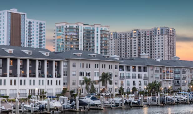 Exterior Over Water at Night at MAA Harbour Island luxury apartment homes in Tampa, FL