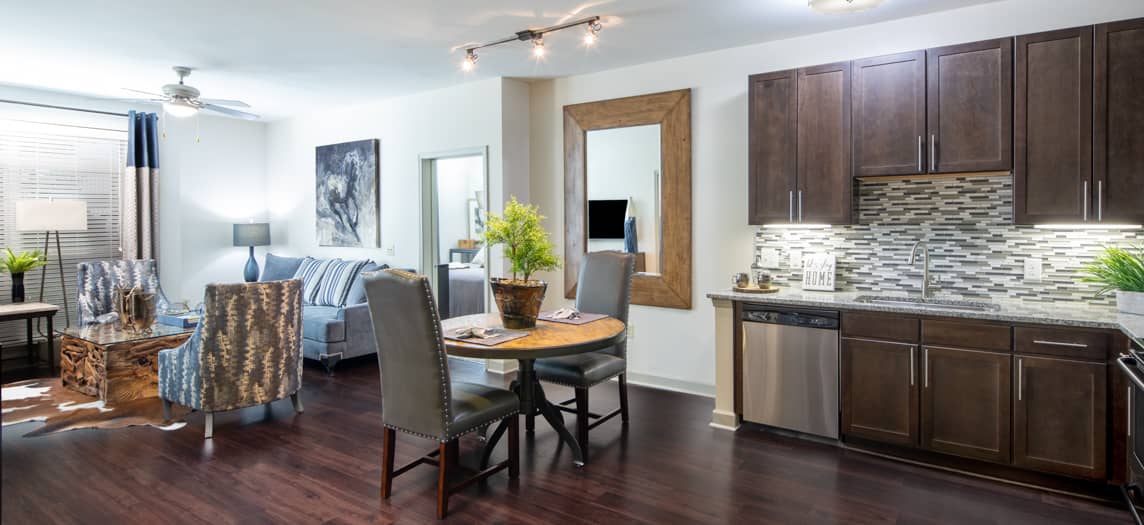 Model Kitchen & Living Room at MAA Charlotte Ave luxury apartment homes in Nashville, TN
