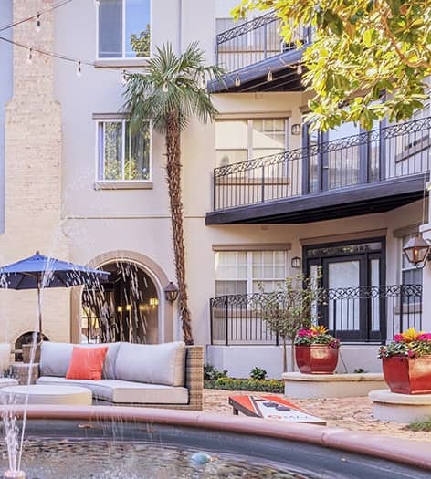 Outdoor courtyard at Post Uptown Village luxury apartment homes in Dallas, TX