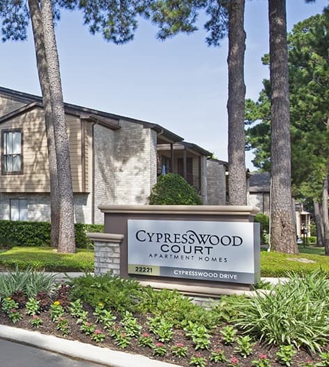 Entrance to Cypresswood Court luxury apartment homes in Houston, TX