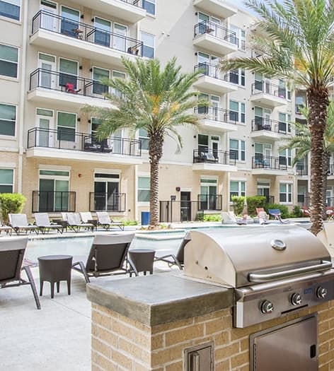 Outdoor grill area at Post Afton Oaks luxury apartment homes in Houston, TX
