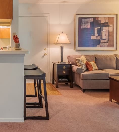 Living room & dining room at Colonial Village at Ashley Park luxury apartment homes in Richmond, VA
