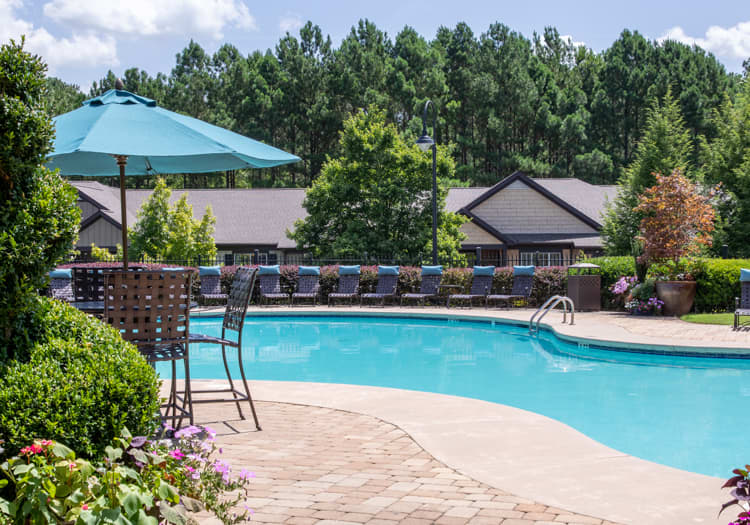 Outdoor swimming pool at MAA Berkeley Lake luxury apartment homes in Duluth, GA