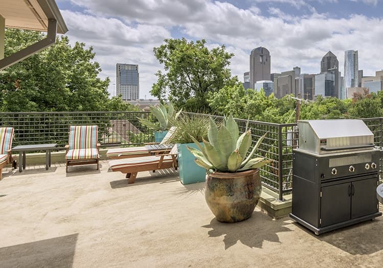 Outdoor grill station at MAA Abbey luxury apartment homes in Dallas, TX