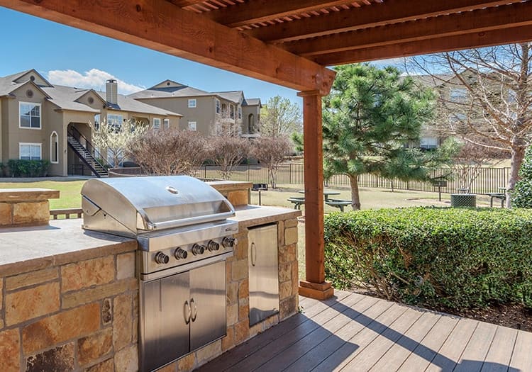 Outdoor grill area at MAA Boulder Ridge luxury apartment homes in Dallas, TX