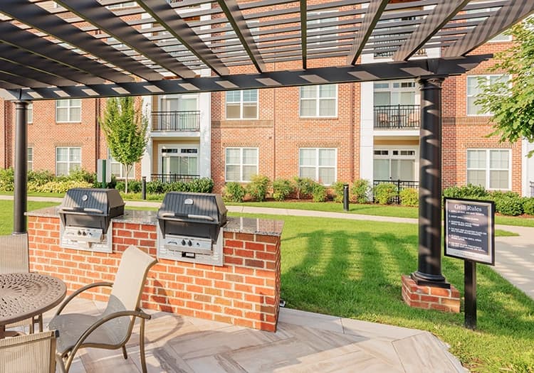 Grill area at The Apartments at Cobblestone Square in Fredericksburg, VA