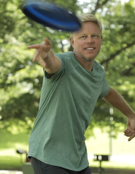 Man throws frisby