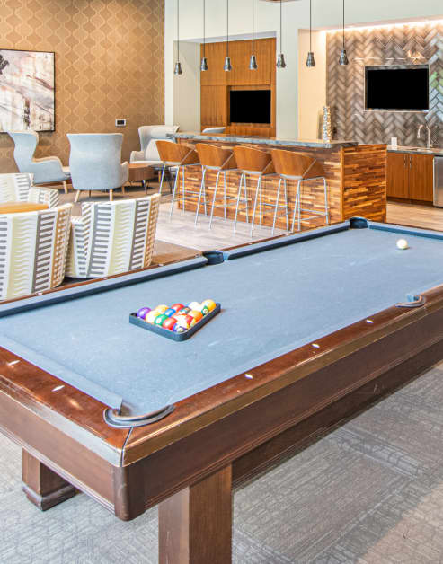 Clubhouse with billiards table at MAA Centennial Park luxury apartments in Atlanta, GA