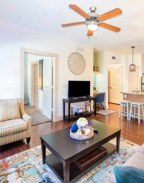 Living room at MAA Grand Cypress luxury apartment homes in Cypress, TX