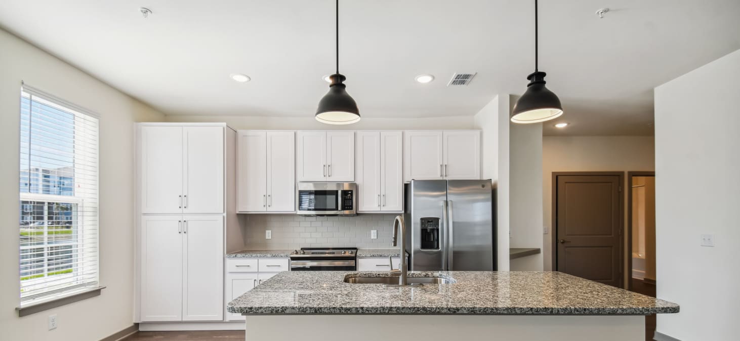 Kitchen at MAA Boggy Creek luxury apartment homes in Orlando, FL