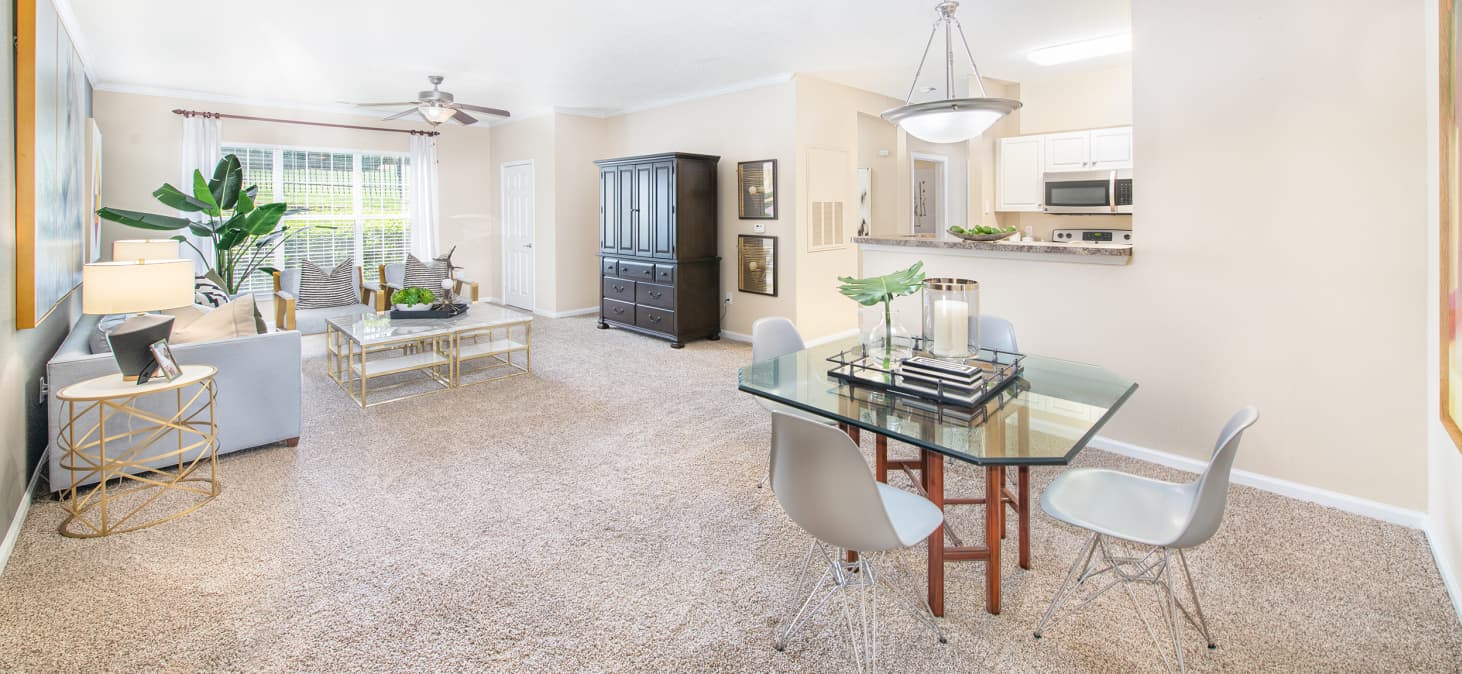 Living and dining area at MAA University Lake at University luxury apartment homes in Charlotte, NC