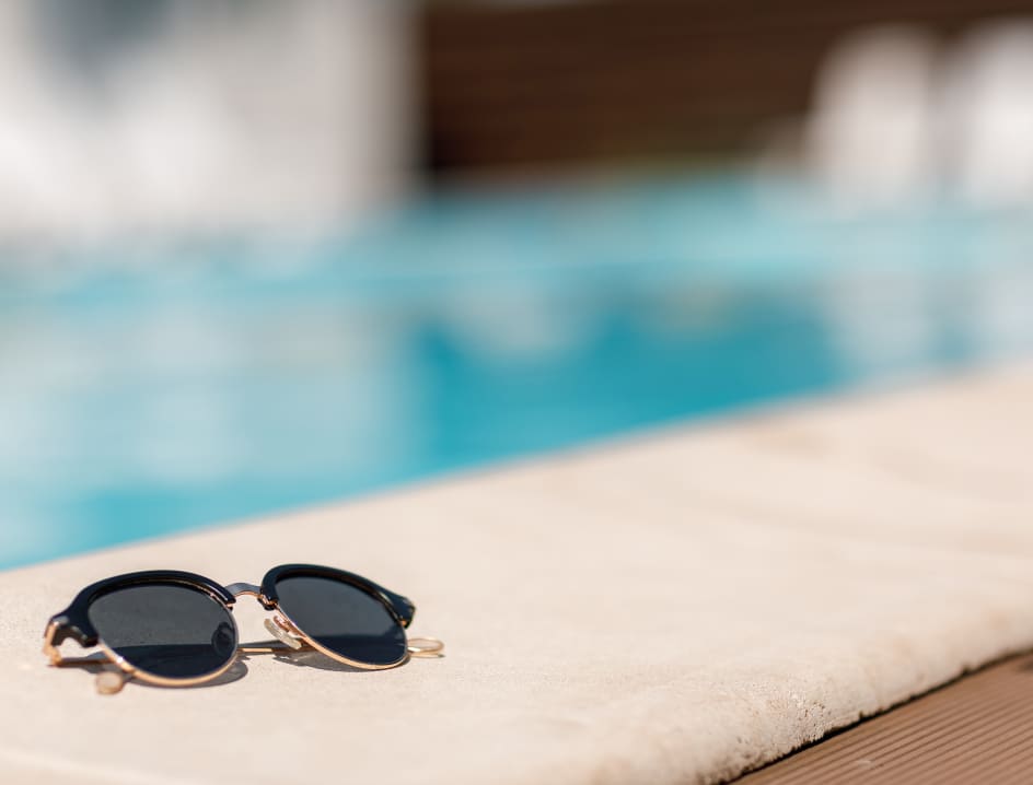 Sunglasses by pool