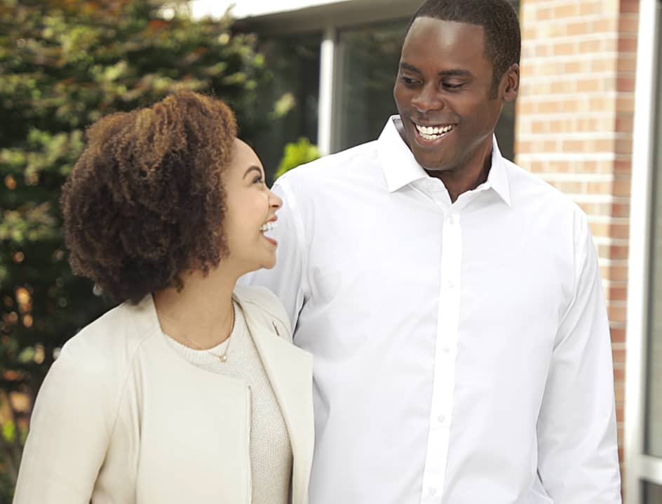 Man and Woman Smiling Outside