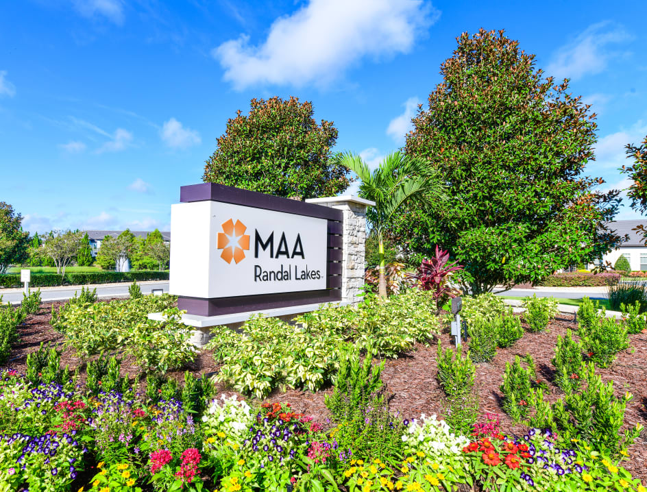 Sign at MAA Randal Lakes luxury apartment homes in Orlando, FL