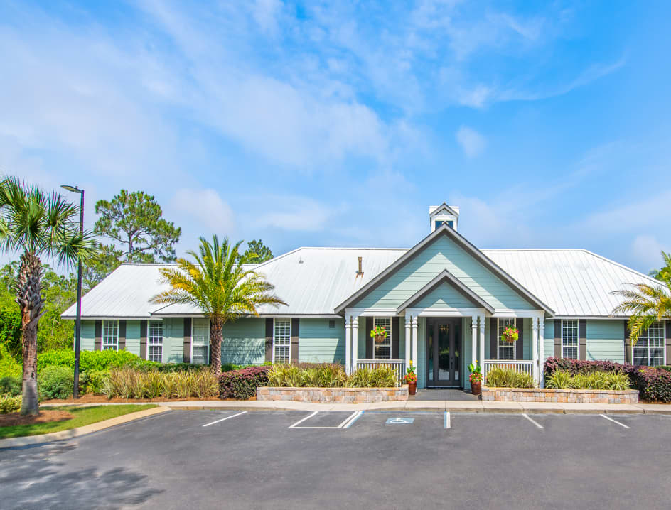 Clubhouse exterior at The Club at Panama Beach luxury apartment homes in Panama City Beach, FL