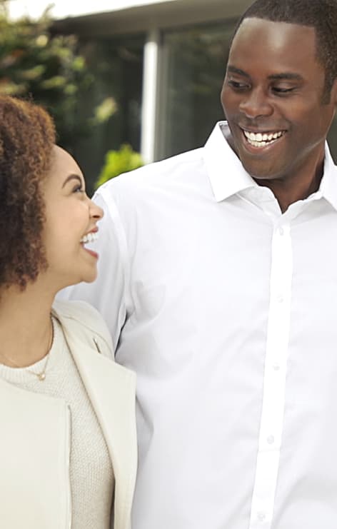 Man and Woman Smiling Outside