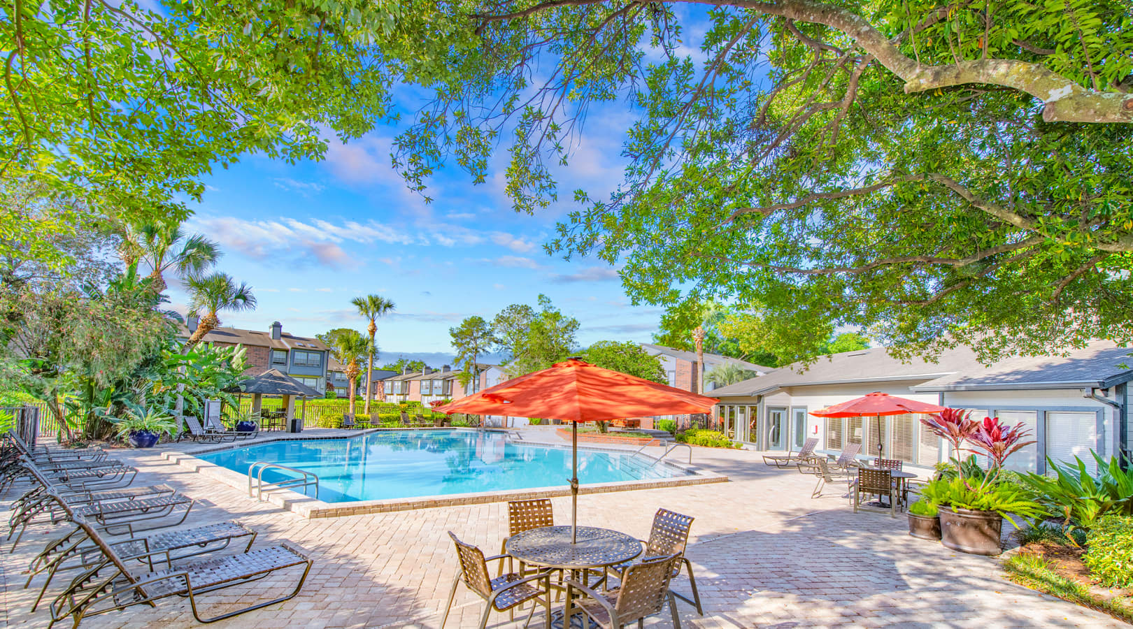 Pool at MAA Tiffany Oaks luxury apartment homes in Orlando , FL
