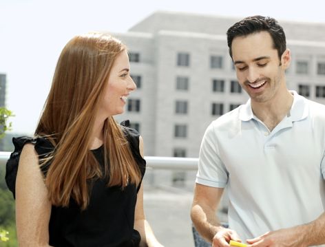 Man and Woman Smiling on Patio