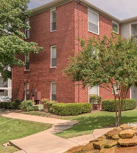 Exterior 2 at Grand Courtyards luxury apartment homes in Prairie, TX