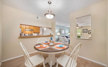 Model Unit Dining Room at TPC Gainesville in Gainesville, FL