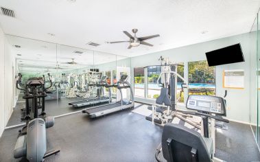 Fitness center at MAA Tiffany Oaks luxury apartment homes in Orlando , FL