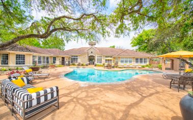 Pool deck at Colonial Grand at Canyon Pointe luxury apartment homes in Austin, TX