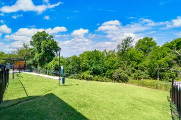 Dog park at MAA Cedar Park luxury apartment homes in Cedar Park, TX