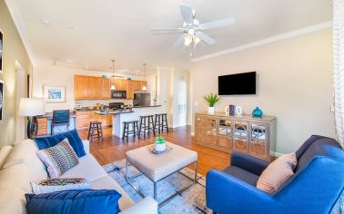 Living room and Kitchen at MAA Double Creek luxury apartment homes in Austin, TX