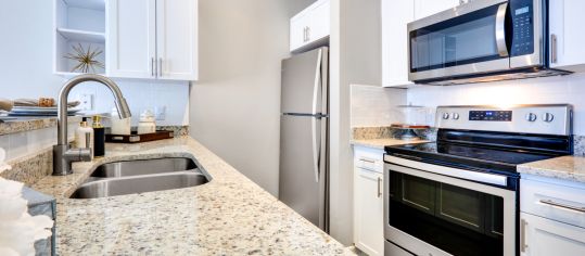 Kitchen at MAA North Hall luxury apartment homes in Dallas, TX