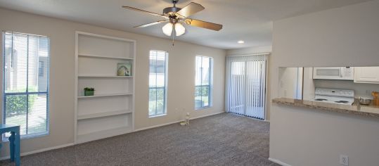 Living room 2 at MAA Cypresswood luxury apartment homes in Houston, TX