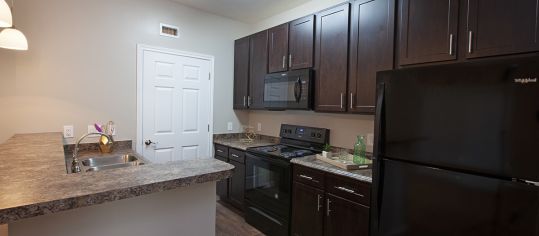 Kitchen at MAA Cypresswood luxury apartment homes in Houston, TX