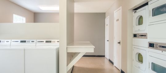 Laundry room at Park Place luxury apartment homes in Greenville, SC