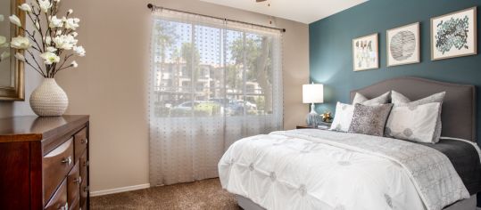 Bedroom at Colonial Grand at Inverness Commons luxury apartment homes in Phoenix, AZ