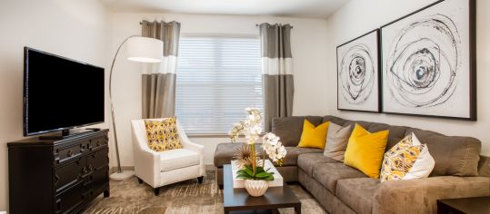 Living room at Sync36 luxury apartment homes in Westminster, CO