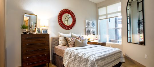 Bedroom at Post River North luxury apartment homes in Denver, CO