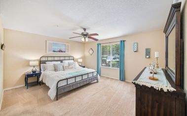 Model Unit Bedroom at TPC Gainesville in Gainesville, FL