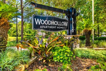 Sign at Woodhollow luxury apartment homes in Jacksonville, FL