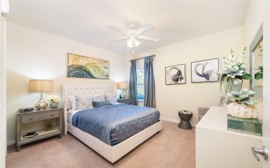 Bedroom at MAA Randal Lakes luxury apartment homes in Orlando, FL