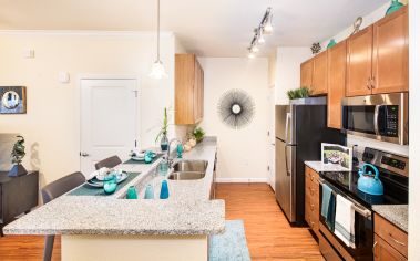 Kitchen at MAA Randal Lakes luxury apartment homes in Orlando, FL