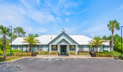 Clubhouse exterior at The Club at Panama Beach luxury apartment homes in Panama City Beach, FL