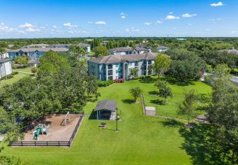 Aerial view of dog park and playground at MAA Brandon in Tampa, FL