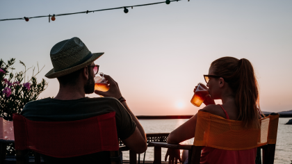 Couple at sunset at MAA Breakwater in Tampa, FL