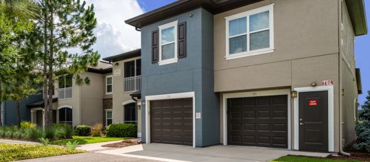 Garage by Pond at MAA Hampton Preserve luxury apartment homes in Tampa, FL