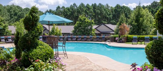 Outdoor swimming pool at MAA Berkeley Lake luxury apartment homes in Duluth, GA 