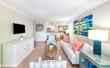 Side view of living room with TV at MAA Mount Vernon luxury apartment homes in Atlanta, GA 