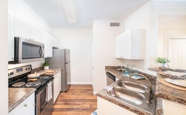 Kitchen with breakfast bar at MAA Wilmington Island luxury apartment homes in Savannah, GA