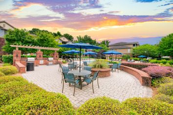 Picnic tables at MAA Matthews Commons luxury apartment homes in Charlotte, NC