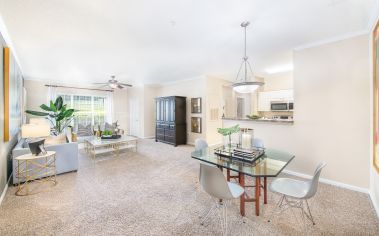 Living and dining area at MAA University Lake at University luxury apartment homes in Charlotte, NC