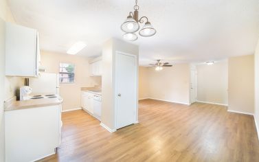 Kitchen and dining area at Balcones Woods luxury apartment homes in Austin, TX